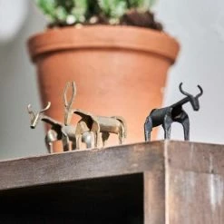 Nkuku Basanti Brass Cow Antique Black Set Of Two