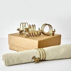 Nkuku Brass, Reindeer Napkin Rings Sold In A Box of 4